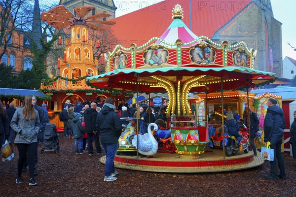 Children's carousel at Christmas market in Flensburg, Schleswig-Holstein, Germany, Europe