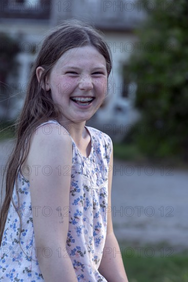 Laughing girl, 10 years old, with braces, Mecklenburg-Vorpommern, Germany, Europe