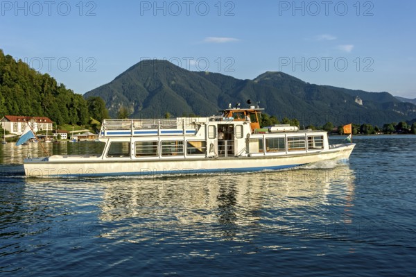 Passenger ship Kreuth on the Tegernsee, boat trip, warm evening light, mountains Wallberg and