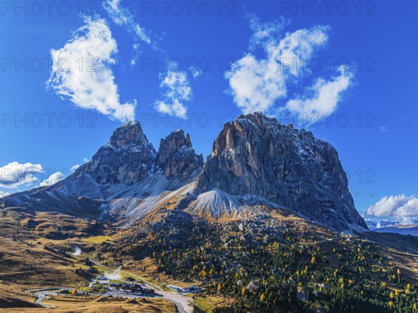 The peaks of the Sassolungo Group, Passo Sella, drone shot, Val Gardena, Dolomites, Autonomous