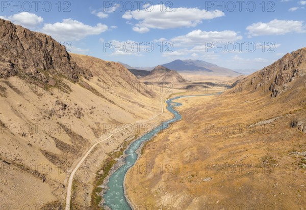 Mountain valley with wild river between hills, Bolgart Valley, Naryn Province, Kyrgyzstan, Asia