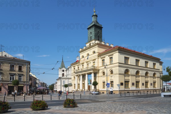 Town square with classicist town hall and tower under a blue sky, Town Hall, Lublin, Poland, Europe