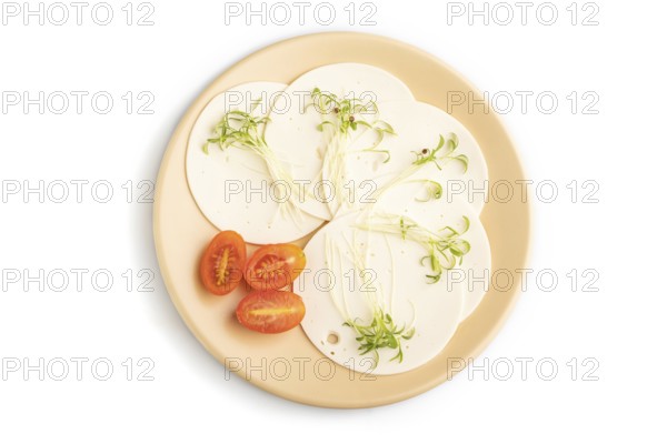 White cheese with tomatoes and cilantro microgreen isolated on white background. top view, flat