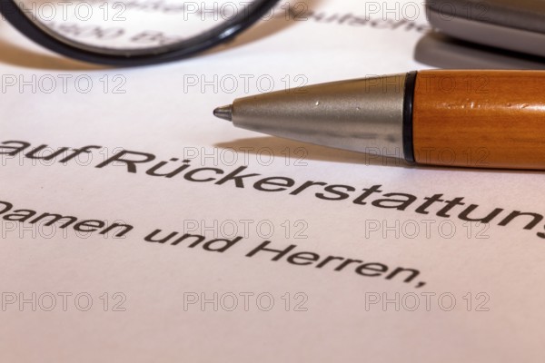 Symbolic image Application for reimbursement: close-up of a cover letter