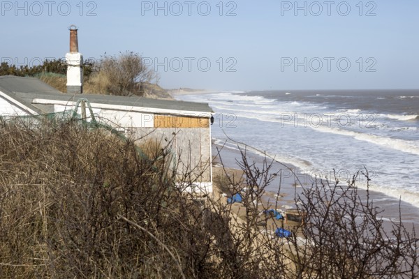 March 2018, Clifftop property collapsing due to coastal erosion after recent storm force winds,