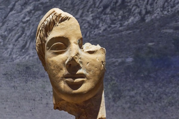 Fragment of an ancient bust with a prominent half of the face, damaged, Archaeological Museum,