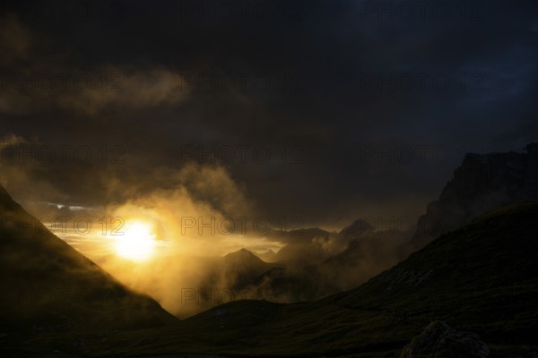 Montafon mountains with dramatic cloudy sky at sunset, Tschagguns, Rätikon, Montafon, Vorarlberg,