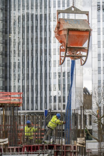 Concrete works, concrete bomb, on a large construction site, construction of a residential and