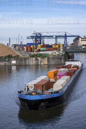 Container freighter Aarburg, leaving the container terminal in Frankfurt Osthafen, belonging to