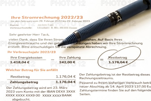 Symbolic image of electricity bill, billing of an electricity provider, additional payment due to