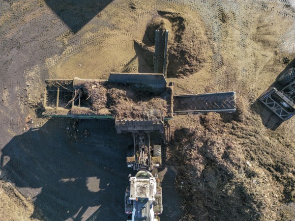 Composting plant, organic waste is composted, sorted by size, smaller parts are reused as compost,