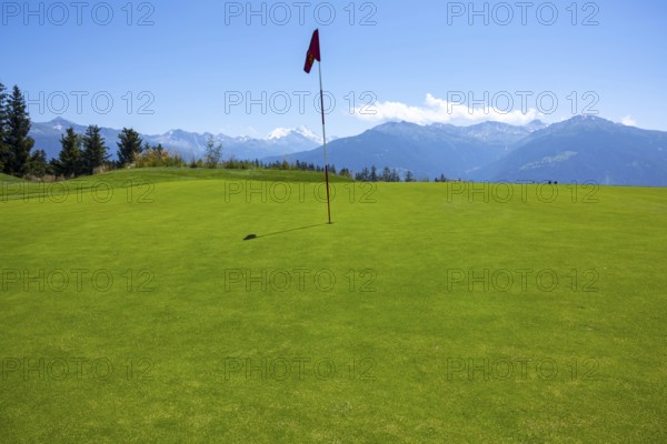Crans Sur Sierre Golf Course with Hole 7 and Mountain View in Crans Montana in Valais, Switzerland,