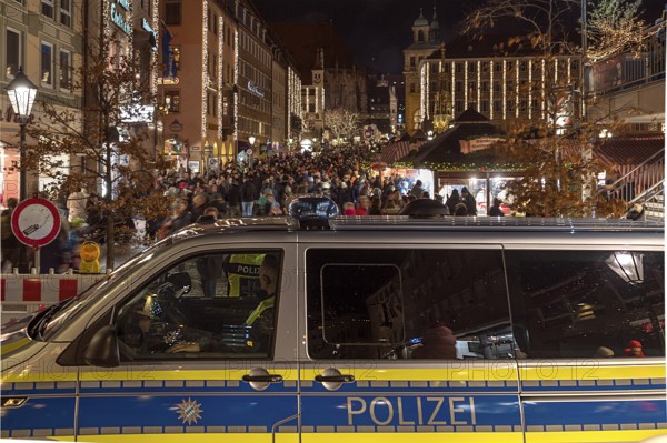Police car in front of the Nuremberg Christmas Market, Nuremberg, Middle Franconia, Bavaria Germany
