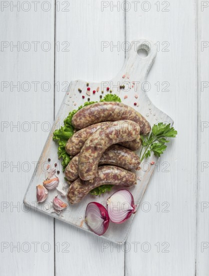 Raw kupaty, traditional Georgian sausages, raw sausages, with spices and herbs, Georgian cuisine