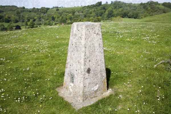 Concrete triangulation pillar on chalk hilltop Giant's Grave, near Oare, Wiltshire, England, UK