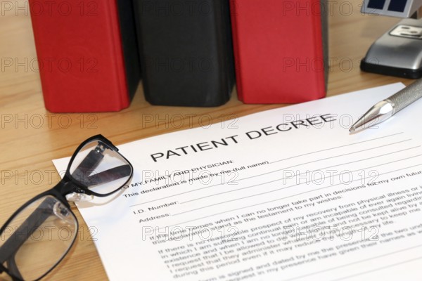Symbolic image: Healthcare proxy, living will in English on a desk