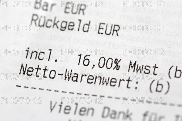 Close-up of a till receipt showing the reduction in VAT to sixteen per cent in Germany due to the