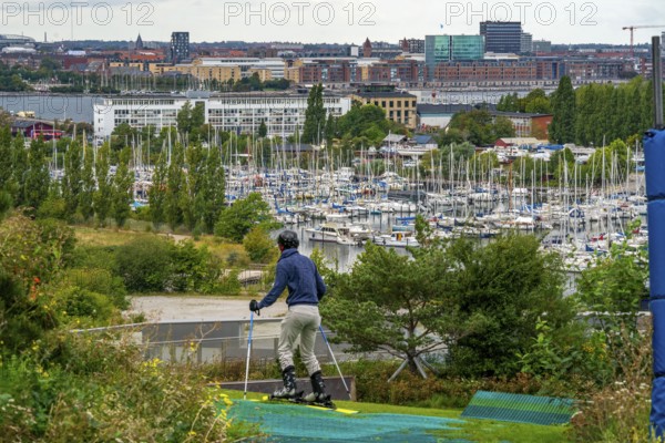 CopenHill, waste incineration plant and artificial ski slope, skiing with a view of Margretheholms