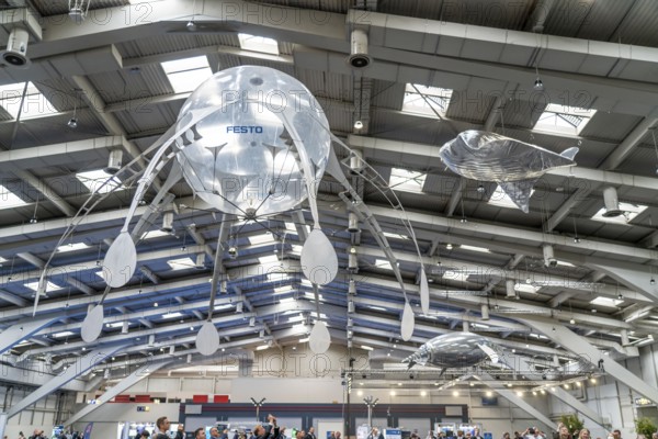 Mechanical flying objects, filled with helium, controlled by fine mechanics, movements copied from