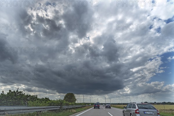 Wind turbines on the A 9 motorway, cloudy sky, Thuringia, Germany, Europe