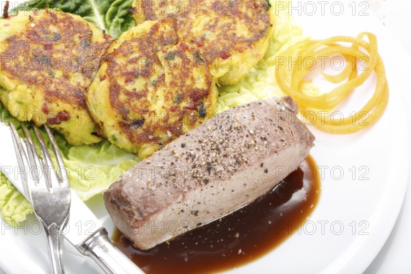 Swabian cuisine, medallions of wild boar with savoy cabbage cakes, meat dish, roasted, hearty, home