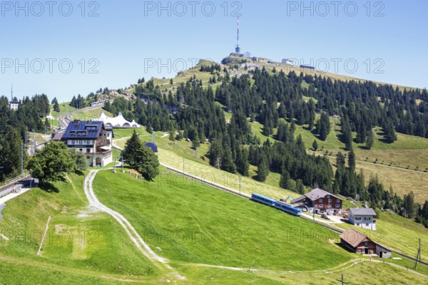 View of Mount Rigi with Rigi railway with Alps mountains in Rigi, Switzerland, Europe