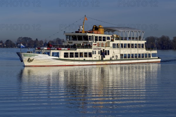 Excursion boat on the Chiemsee in winter, behind Fraueninsel, Upper Bavaria, Bavaria, Germany,