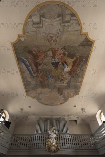 Ceiling painting and the figure of St. Nepomuk in front of the organ loft in the parish church of