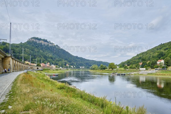 Elbe landscape and ferry as well as Königstein Fortress in the background top left, Königstein,