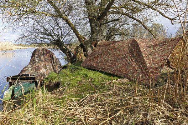 Campsite of a nature photographer on the river Trebel, people out in nature, Peene Valley River