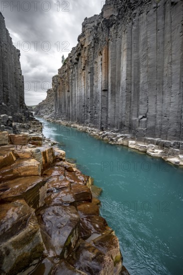 Stuðlagil Canyon, turquoise river between basalt columns, Egilsstadir, Iceland, Europe