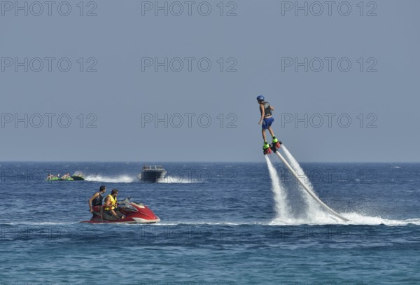 Water sports on the Super Paradise Beach, water jetpack, Mykonos, Cyclades, Greece, Europe