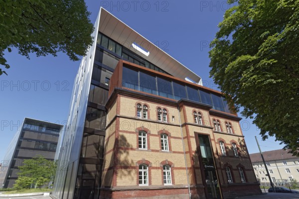 Historic building integrated into modern office building by SOP Architekten, Grant Thornton AG
