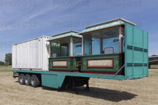 Truck semi-trailer, loaded with two ticket booths of an amusement ride, Rheinkirmes superstructure,