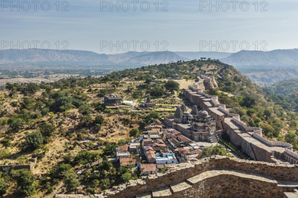 Temples and houses inside the walls of Kumbhalgarh fort. Rajasthan, India, Asia