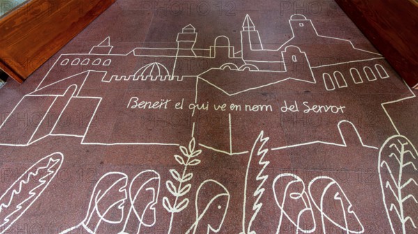 Drawings and painting on the floor at the entrance to the Sagrada Familia, Barcelona, Catalonia,