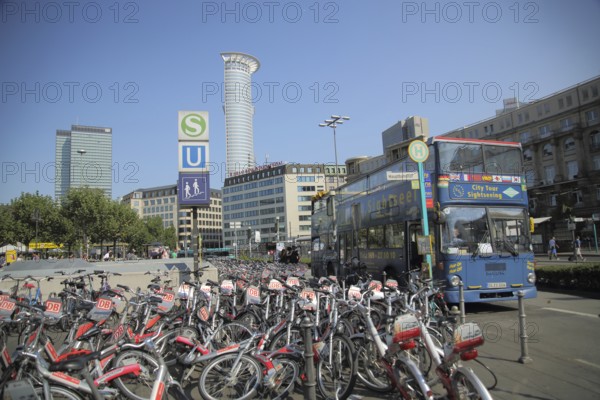 City Tour Sightseeing Bus at Main Station with parking space for bicycles, rental bikes, disorder,