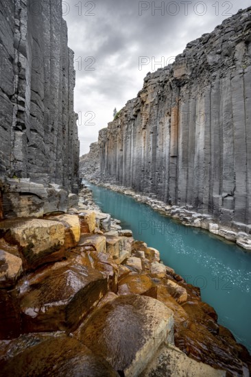 Stuðlagil Canyon, turquoise river between basalt columns, Egilsstadir, Iceland, Europe