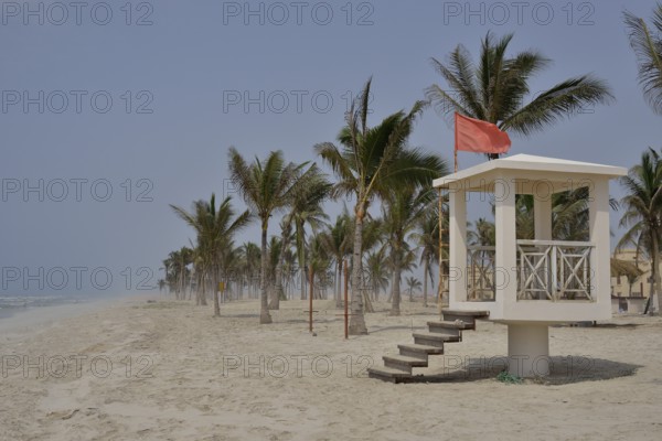 Red flag, bathing is prohibited, on Salalah Beach, Salalah, Dhofar Region, Oman, Asia