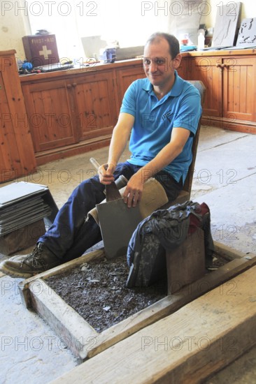 Demonstration of slate working, National slate museum, Llanberis, Gwynedd, Snowdonia, north Wales,