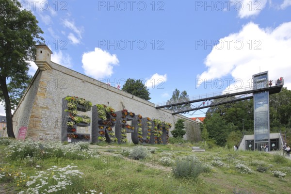 Lettering Erfurt with planting, greening, vertical garden, nature, green, and modern lift to the