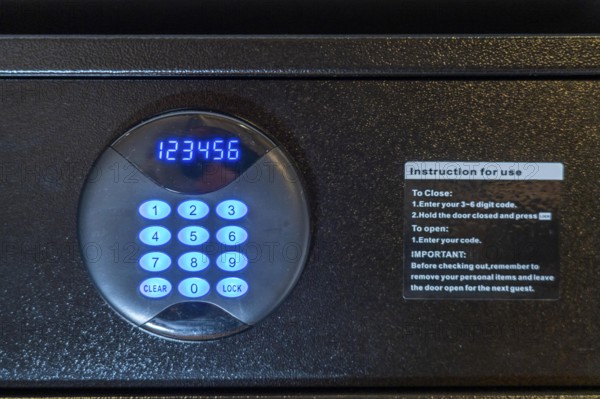Room safe in a hotel, keypad for entering a 6-digit numerical code to lock the safe for depositing
