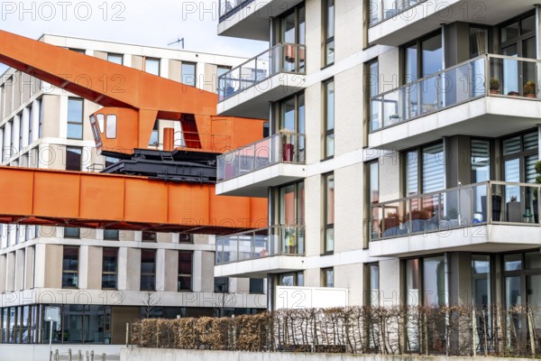 New harbour, harbour basin, harbour district, old harbour crane and new residential buildings,