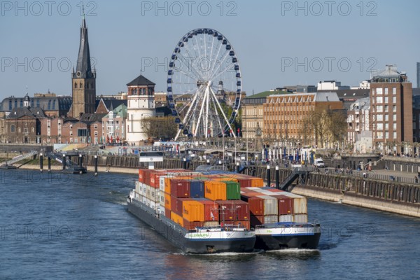 Container freighter, Milliennium II, as a coupling unit, on the Rhine, on the banks of the old