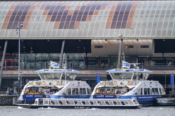 GVB ferries for pedestrians and cyclists across the river Ij, to Amsterdam Centraal station, free