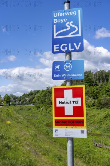 Riverside path along the Boye, emergency board, with location designation, stream, runs for 13.8 km