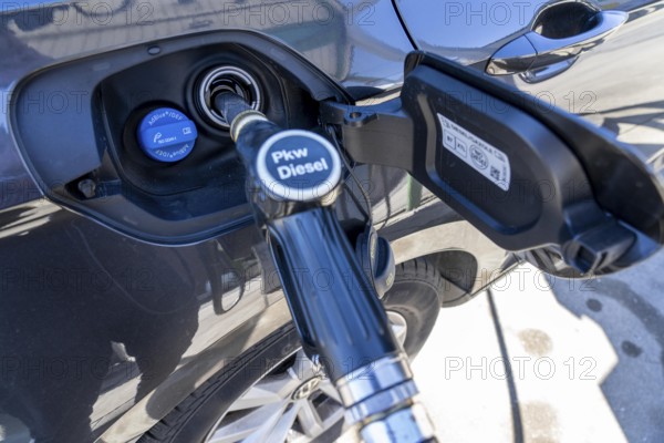 Diesel car is refuelled with diesel fuel, petrol station, Ad-Blue