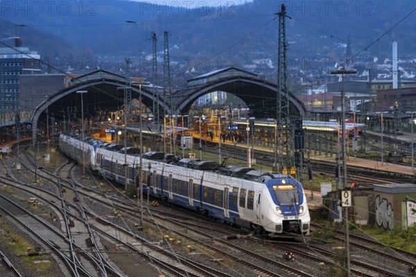 The main railway station of Hagen, station halls, tracks, platforms, regional express train of