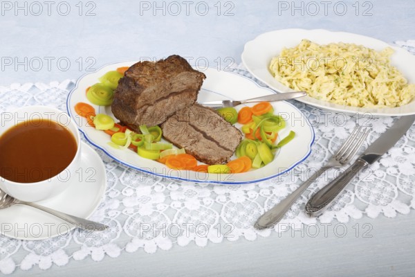 Swabian cuisine, roast beef, roast ox, herb spaetzle, meat dish, gravy, carrot vegetables, leek,