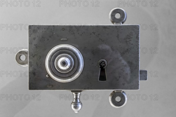 Old 18th century metal door lock plate